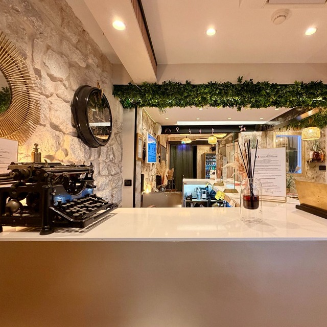 The reception desk and its vintage typewriter